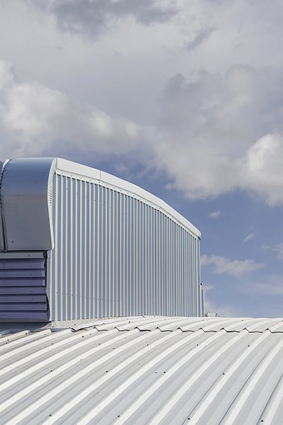 close up of white metal roof on commercial building